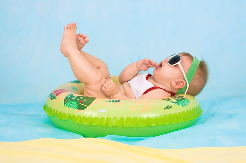 baby lying on inflatable ring, HD wallpaper
