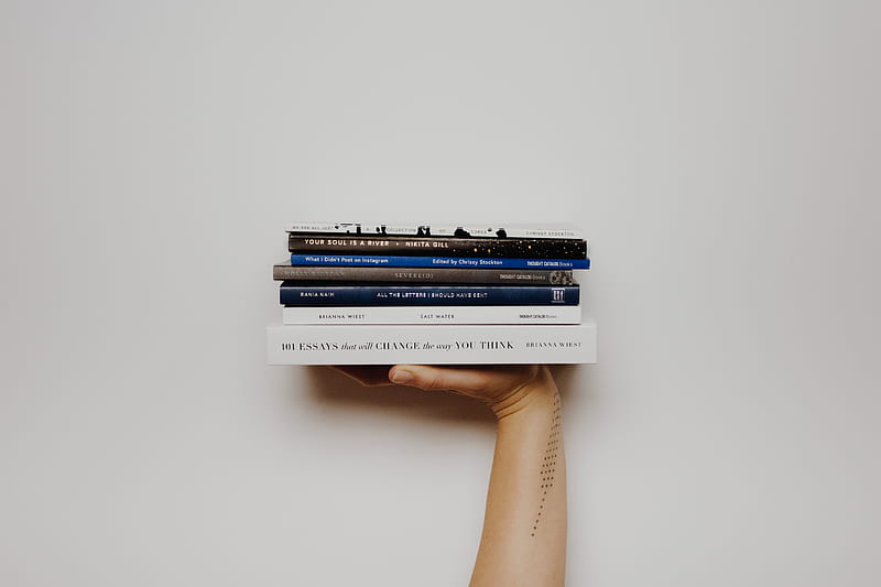 person holding pile of books, HD wallpaper