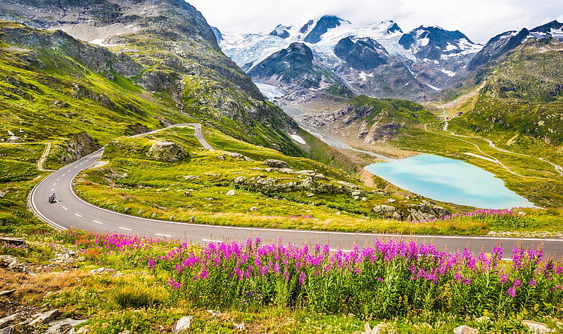 Motorcyclist on mountain pass road, drive, Alps, view, wind, bonito, pass, lake, motorcyclist, mountain, speed, wildflowers, summer, road, scenery, gorgeous, HD wallpaper