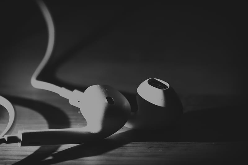 Earphones and books on table, closeup :: Stock Photography Agency ::  Pixel-Shot Studio