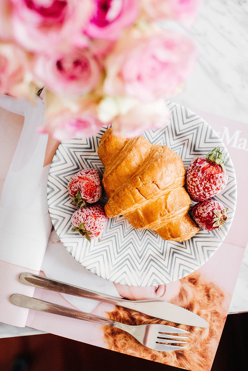 croissant bread and stawberries on beside fork and knife, HD phone wallpaper