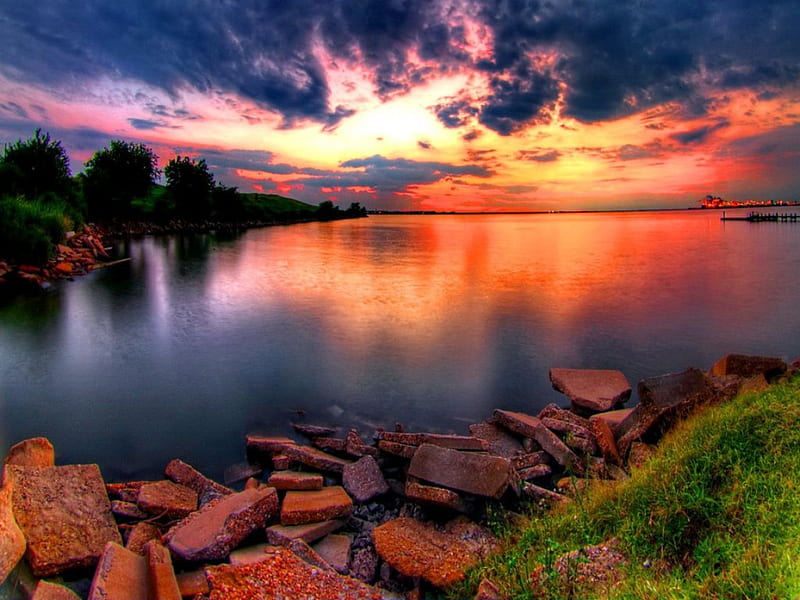 Sunset river, pretty, neautiful, shore, riverbank, grass, sunset, clouds, mirrored, mountain, sundown, nice, stones, calm, bright, village, sunrise, reflection, harmony, lovely, town, sky, water, red, glow, dock, city, green, river, light, clear, pier, colors, lake, summer, nature, lakeshore, HD wallpaper
