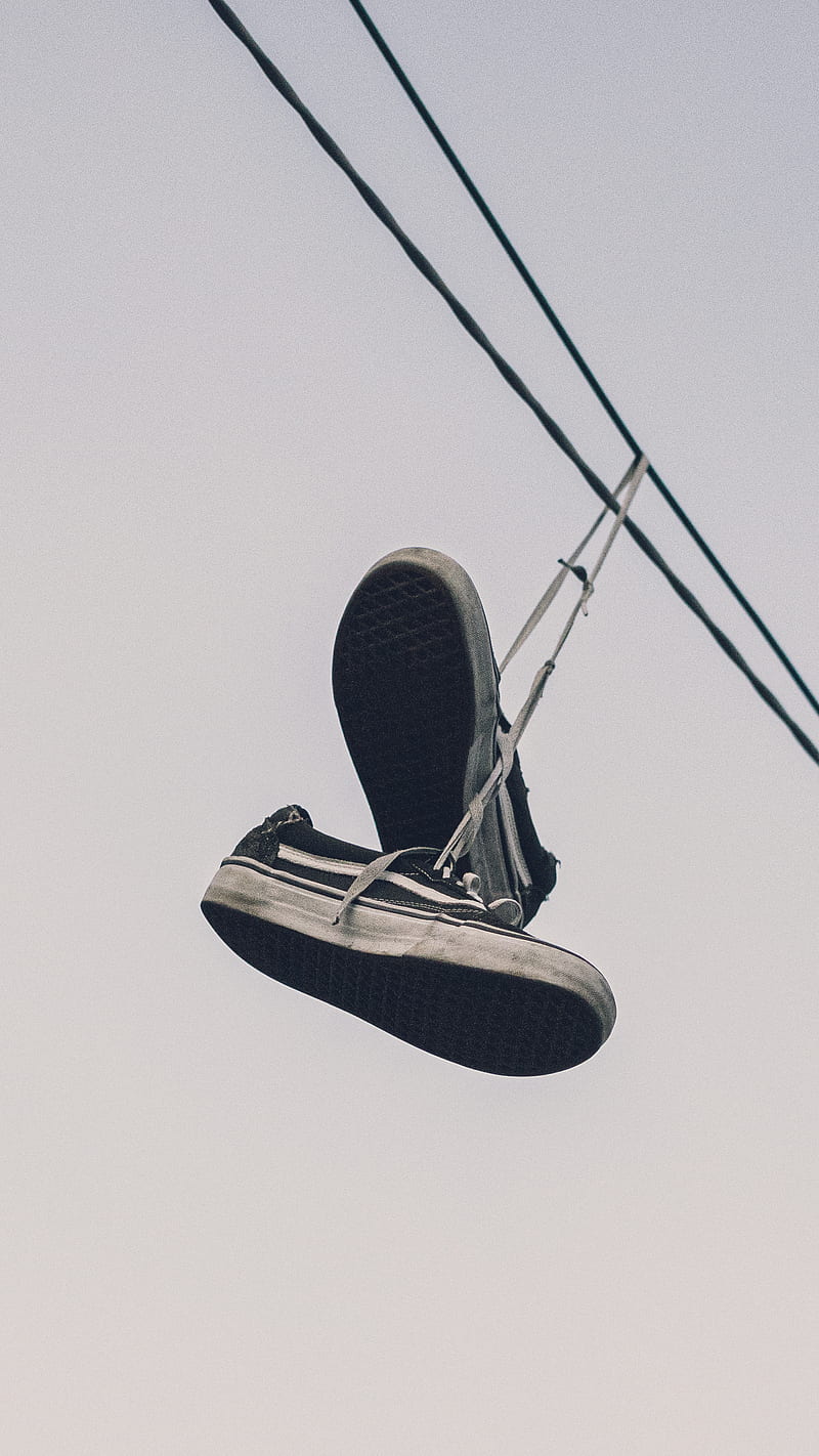 Sneakers hanging from power lines means, this?! 🤔 But did you know wh... |  why do they throw shoes on the powerline | TikTok