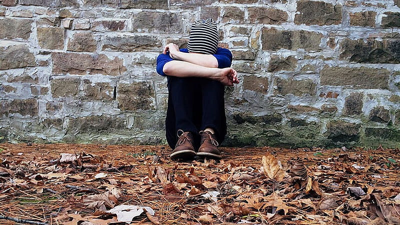 Sad Young Man Is Sititng Alone Hiding Face With Hands In Brick Wall Background Sad, HD wallpaper