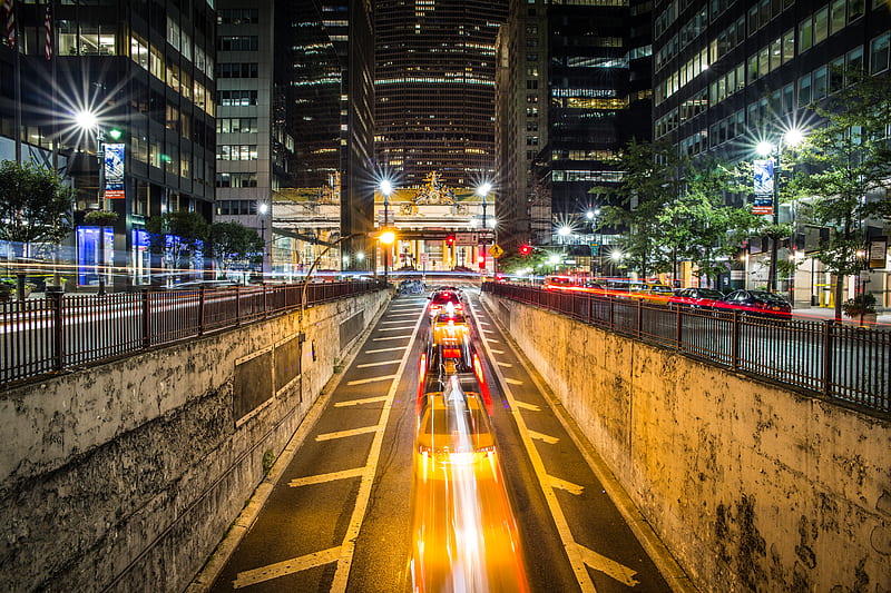 time lapse graphy of vehicle passing on concrete road surround high-rise buildings during night time, HD wallpaper