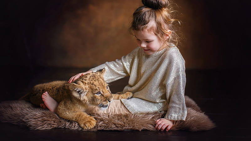 Cute Little Girl With Lion Cub Is Wearing Glittering Dress Sitting On Fur Cloth Cute, HD wallpaper