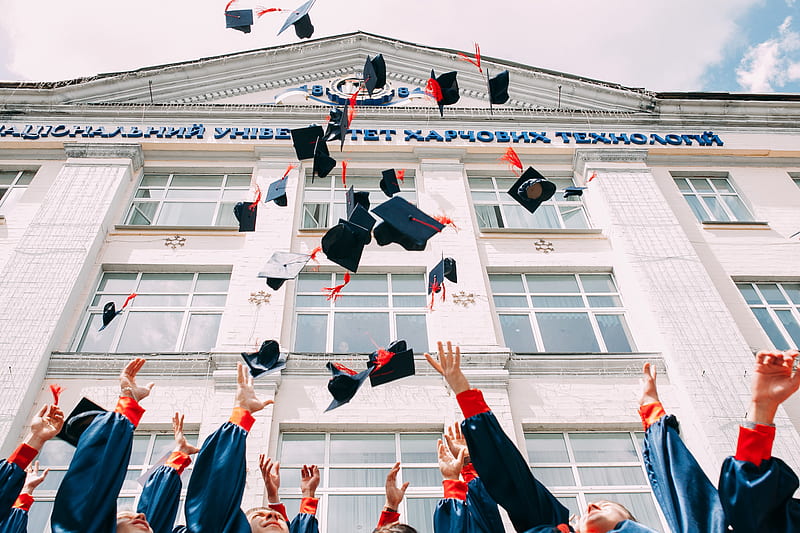 group of fresh graduates students throwing their academic hat in the air, HD wallpaper