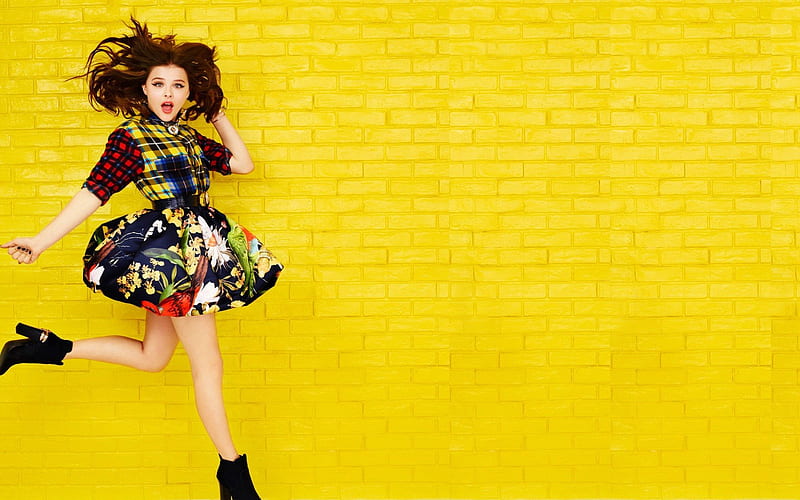 Selena Gomez, singer, jump, yellow wall, beauty, brunette, HD wallpaper