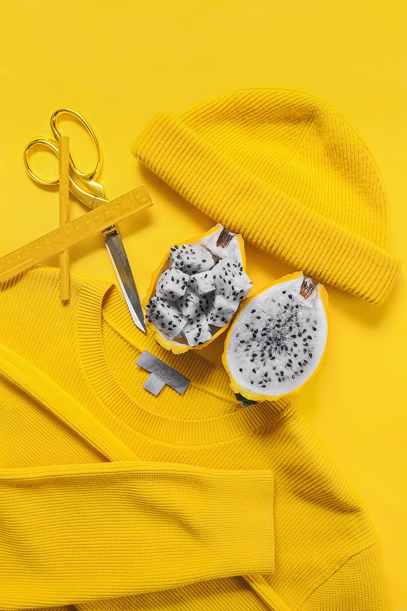 Top view of yellow hat sweater scissors and fruit united in excitement and bold art composition, HD phone wallpaper