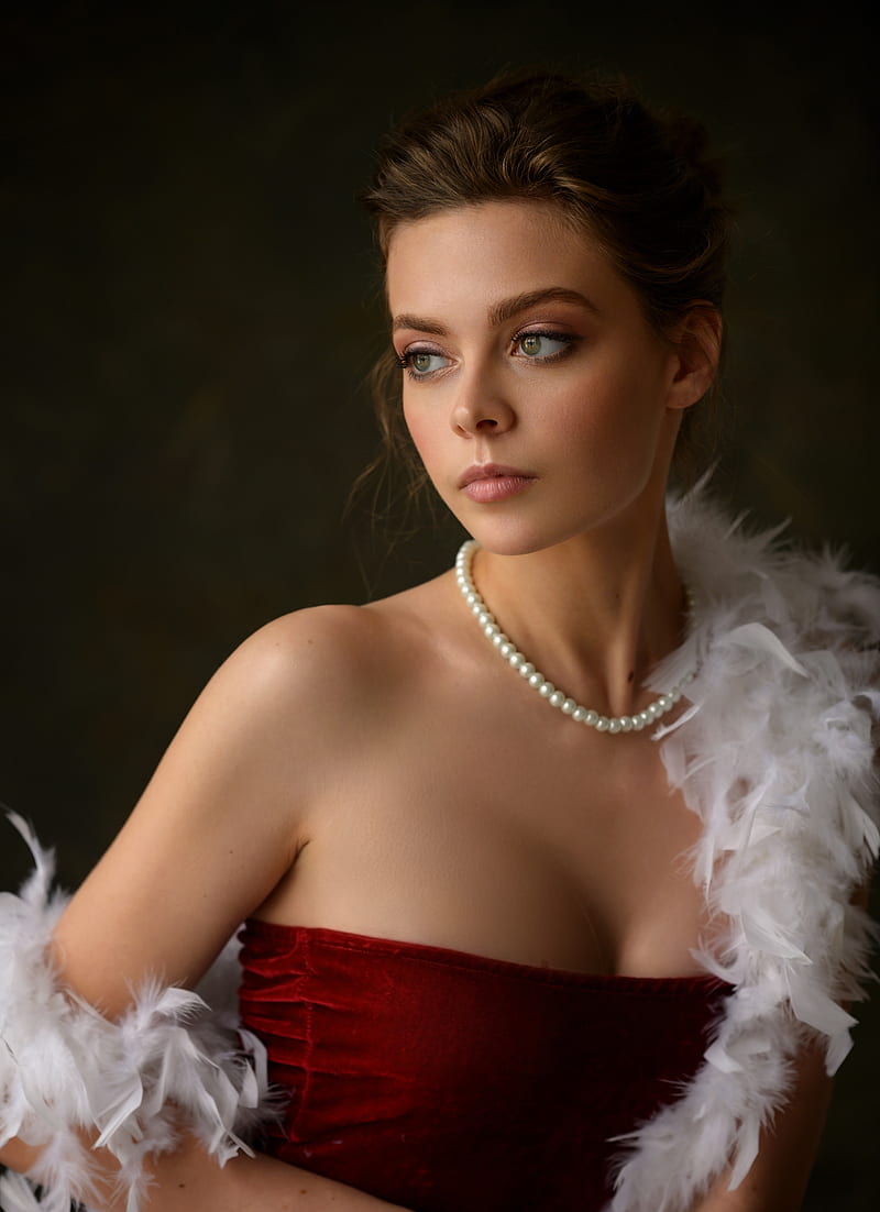 Dennis Drozhzhin, women, brunette, makeup, glamour, looking away, necklace, beads, feathers, dress, red clothing, bare shoulders, simple background, thick eyebrows, green eyes, HD phone wallpaper