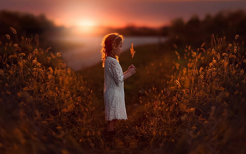 girl in field sunset