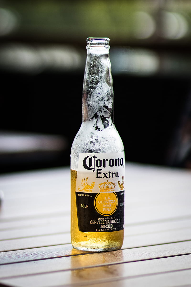 Corona Extra beer bottle on brown wooden surface during daytime, HD phone wallpaper