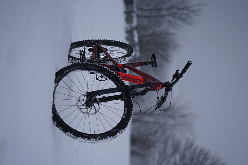 black and red hardtail mountain bike on snow covered ground during daytime, HD wallpaper