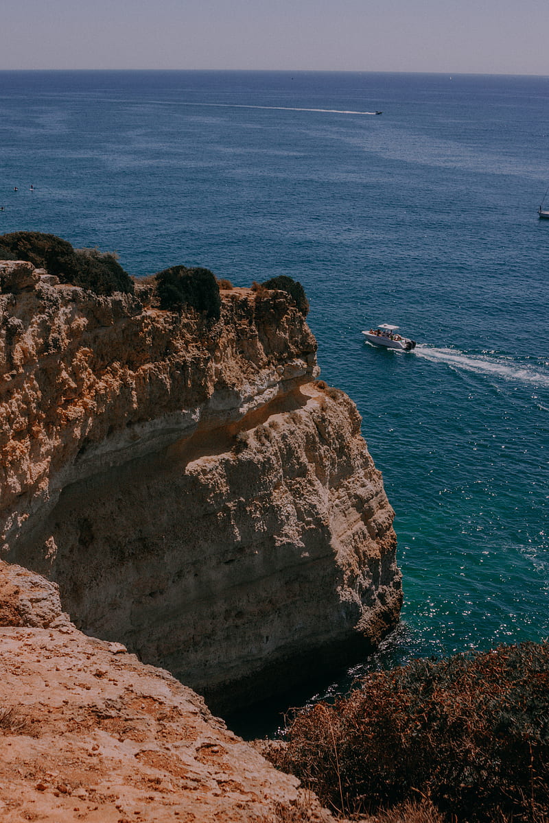 motorboat near cliff, HD phone wallpaper