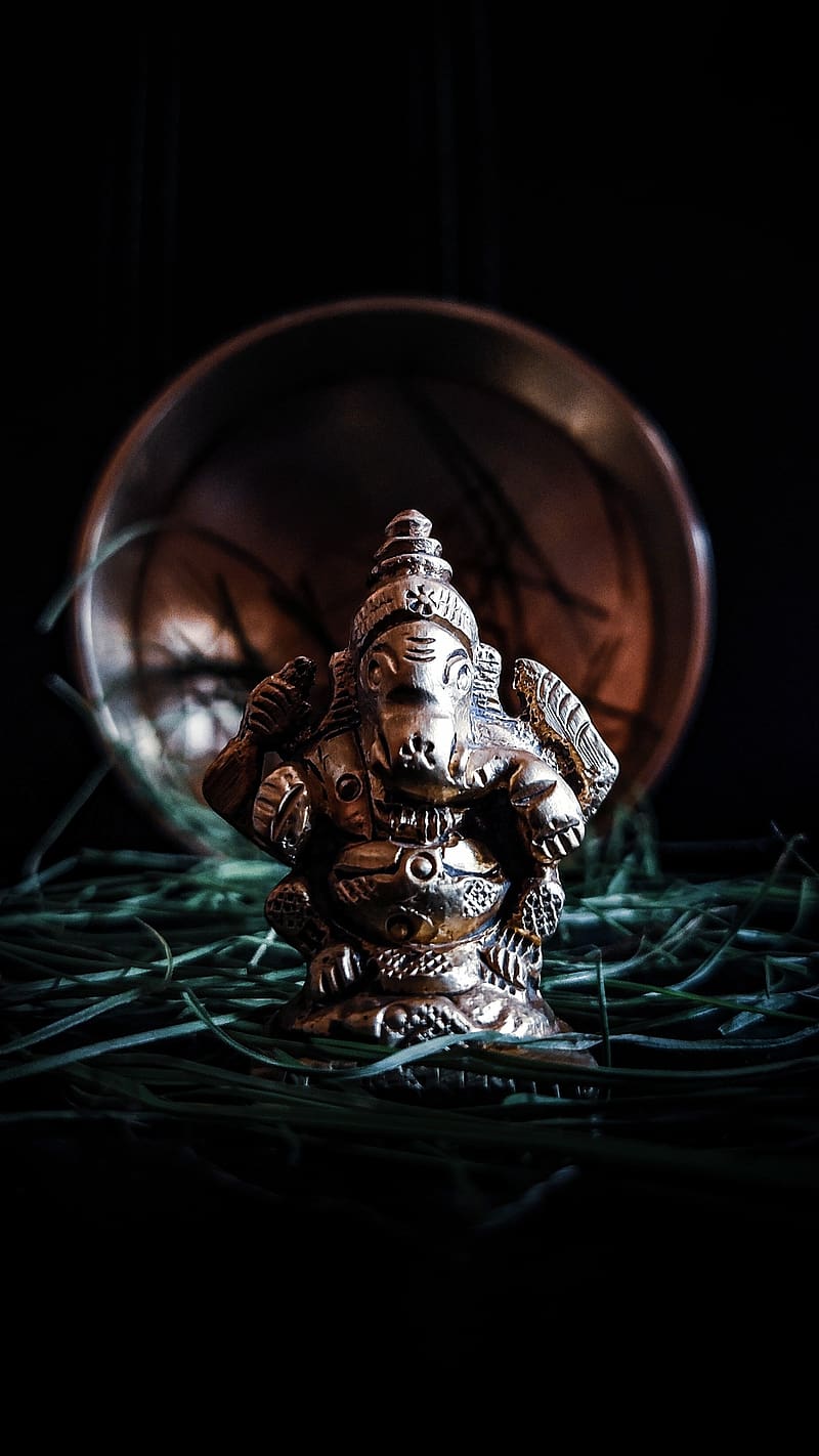 White Cute Ganesha Decorated Dressed in Gold on abstract dark gold bokeh  background 3d rendering. 3D