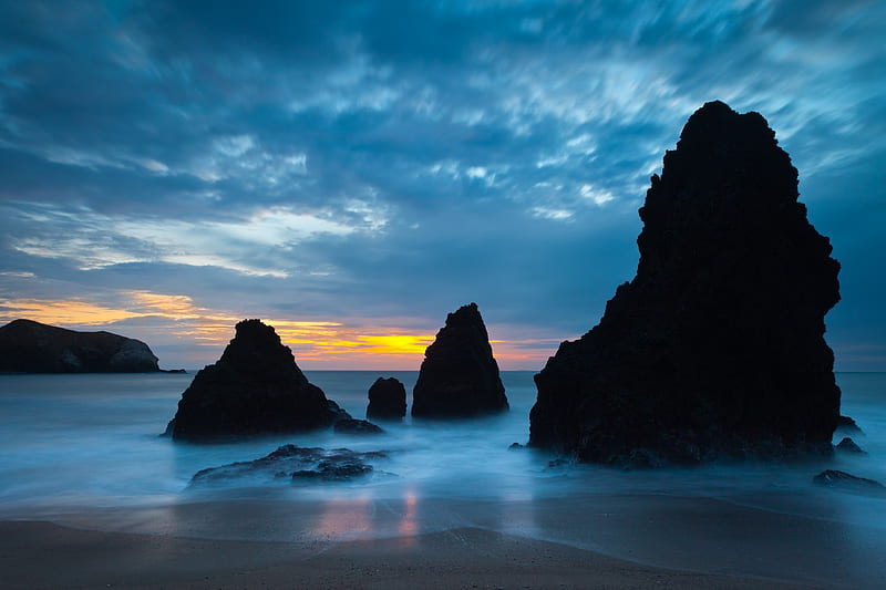 Large stones on a beach during morning, stones, morn, ocean, surf, morning, sky, rocks, clouds, beach, dark, HD wallpaper