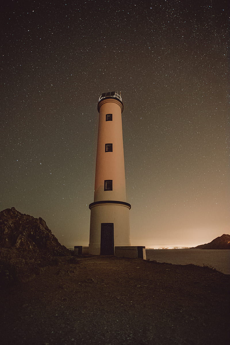 lighthouse, building, starry sky, stars, night, rocks, HD phone wallpaper