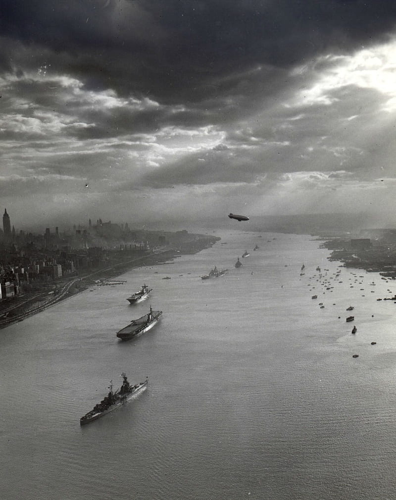 graphy, monochrome, United States Navy, river, Battleship, ship, USA, New York City, history, 1945, Zeppelin, clouds, portrait display, cityscape, skyscraper, sun rays, historic, vintage, old , Hudson River, parade, HD phone wallpaper