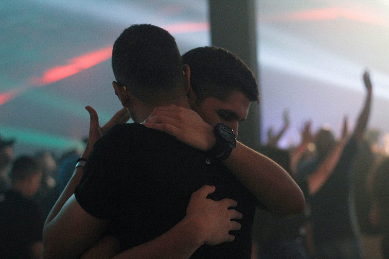 two men hugging each other inside bar, HD wallpaper
