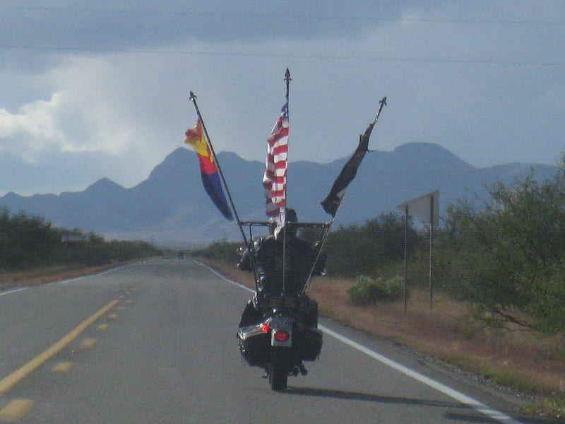 Proud Flag Bearer, highway, flags, mountains, motorcycle, HD wallpaper