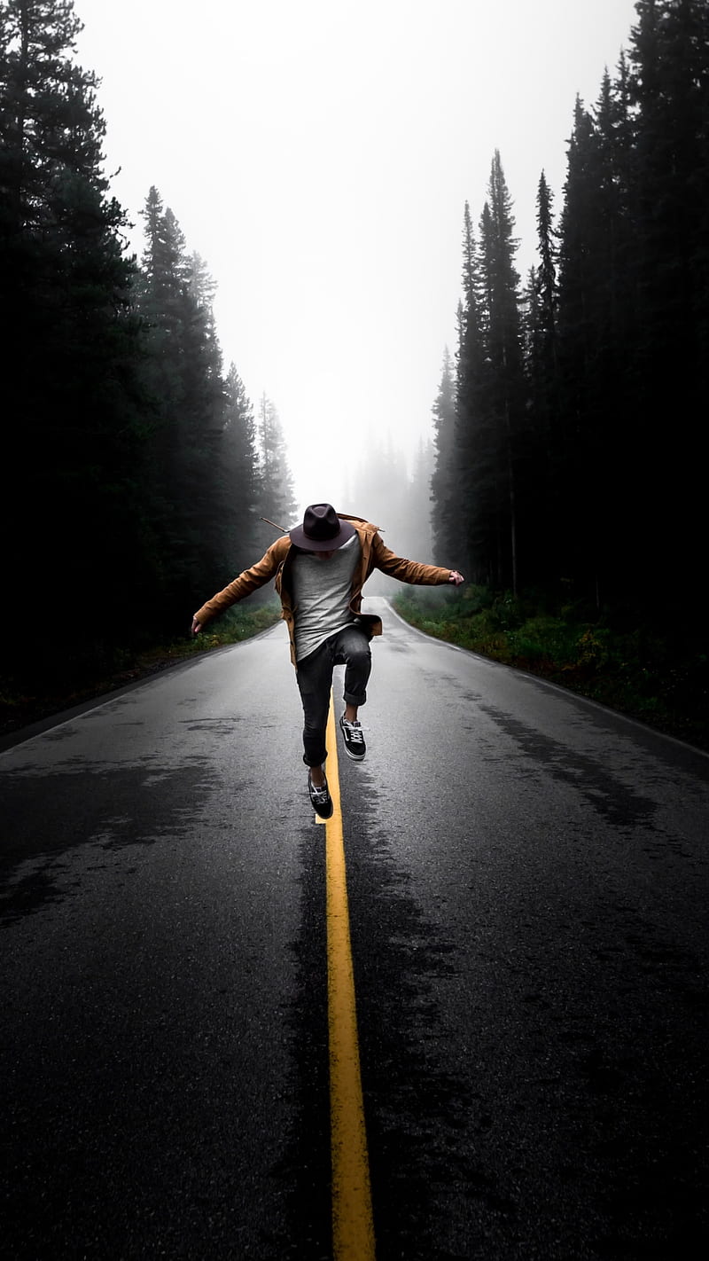 Dancing on the road, cloudy, dance, male, rainy, trees, yellow line, HD phone wallpaper