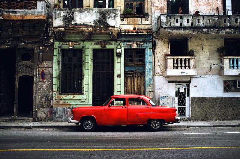 red car parked on road in front concrete building, HD wallpaper