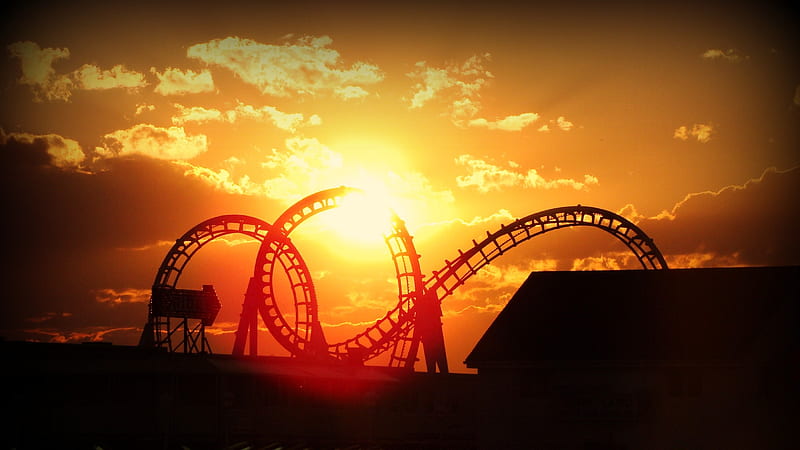 Sunset pierces through amusement park roller coaster during golden hour, golden hour, roller coaster, golden, ride, sunset, sun, clouds, sky, amusement park, gold, HD wallpaper