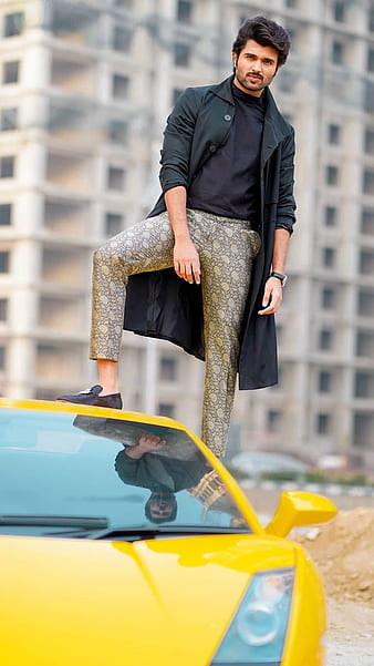 Curly stylish girl wear on blue jeans skirt, blouse and glasses posed near  blue car at street of city. 8679157 Stock Photo at Vecteezy