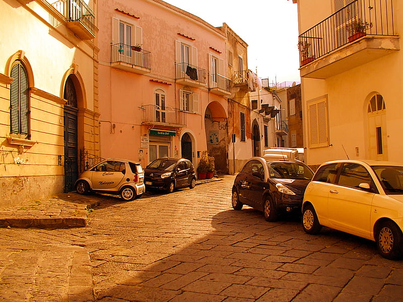 Houses In Forio Ischia Italy, houses, sunny, doors, ischia, windows, balconies, shadows, forio, village, street, scene, italy, paving, small cars, HD wallpaper