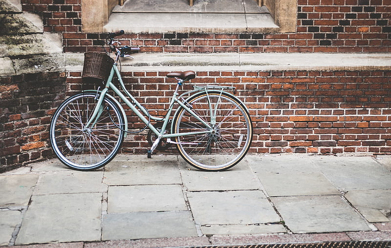 parked blue commuter bike on gray brick wall, HD wallpaper