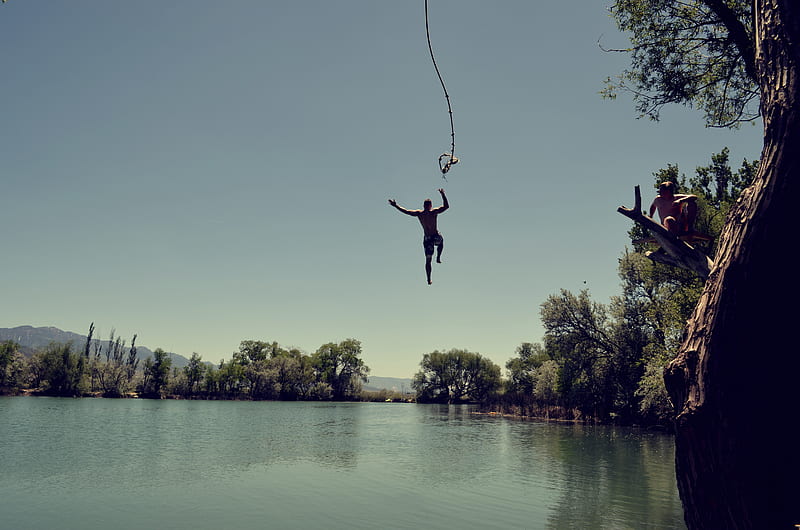 man jumping on body of water with rope, HD wallpaper