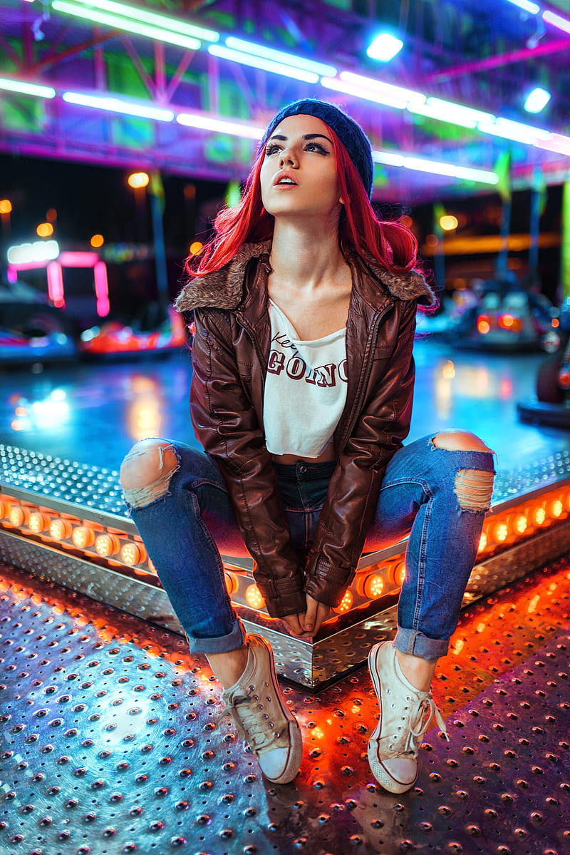 Delaia Gonzalez , women, model, dyed hair, looking up, long hair, woolly hat, jacket, brown jacket, leather jackets, white tops, crop top, jeans, torn jeans, denim, ripped clothes, Converse, sitting, depth of field, theme parks, night, lights, outdoors, women outdoors, portrait display, Gustavo Terzaghi, tiptoe, HD phone wallpaper