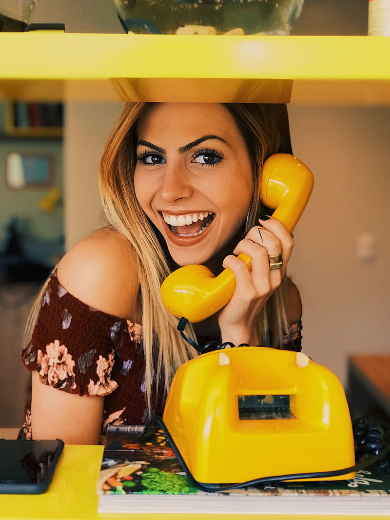 woman holding yellow rotary telephone, HD phone wallpaper