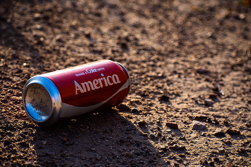 Coca-Cola America tin can on brown soil, HD wallpaper