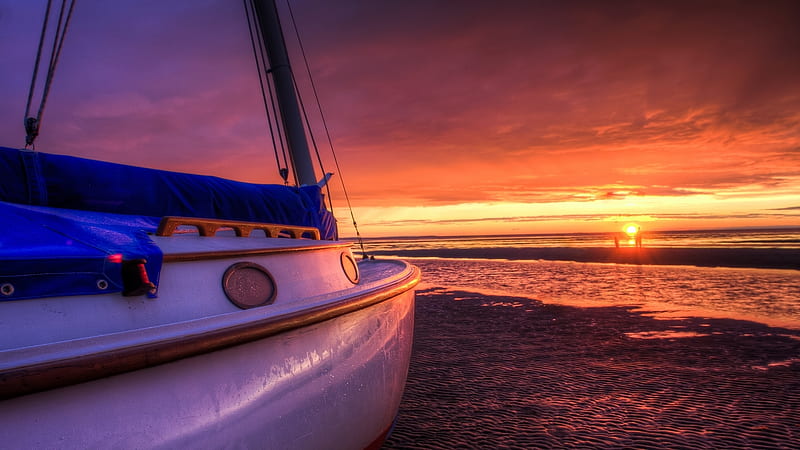 Boat shored at a low-tide beach at sunset, sunset, sail, sea, beach, gold, water, tide, boat, ship, golden hour, coast, shore, sun, sailing, clouds, old, sand, ocean, golden, sky, HD wallpaper