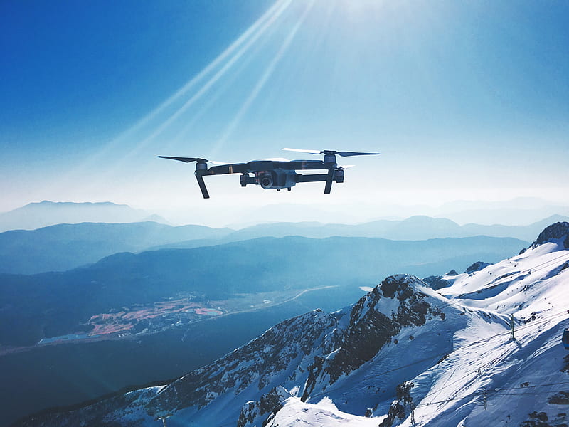 white quadcopter drone flying near snow mountain during daytime, HD wallpaper