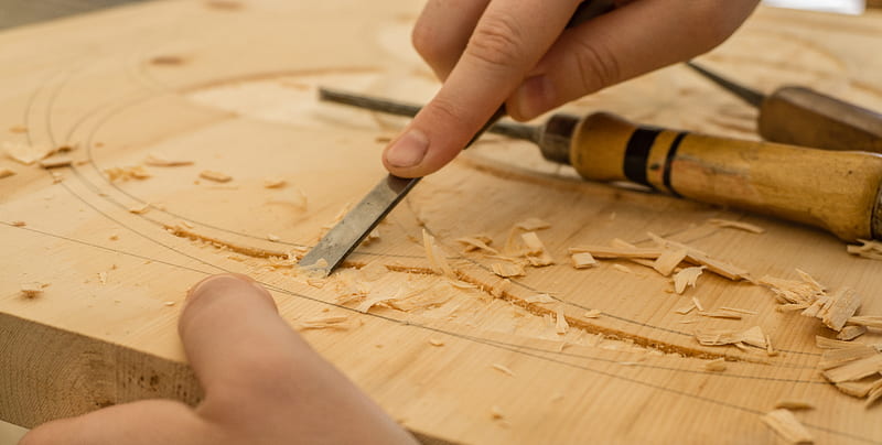 person using chisel while curving wood, HD wallpaper