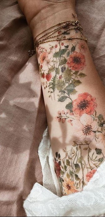 Arm Flower Tattoo by Full Circle Tattoos