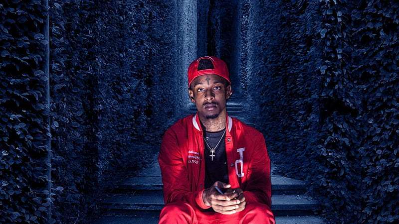21 Savage Is Sitting On Steps Between Blue Leaves Wall Wearing Red Dress And Cap 21 Savage, HD wallpaper
