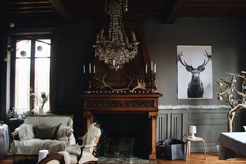 brown wooden fireplace beside a gray fabric sofa chair, HD wallpaper