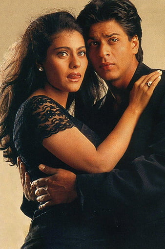 Shahrukh Khan and Kajol Embrace in Romantic Bollywood Pose