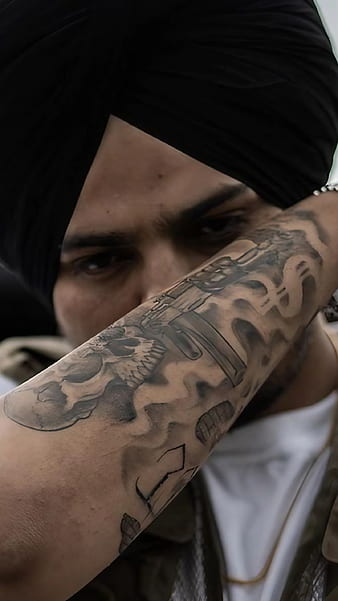 Tattoo Tribute to Sidhu Moose wala: हरियाणा में सिद्धू मूसेवाला का टैटू  बनवाकर श्रद्धांजलि दे रहे उनके फैन