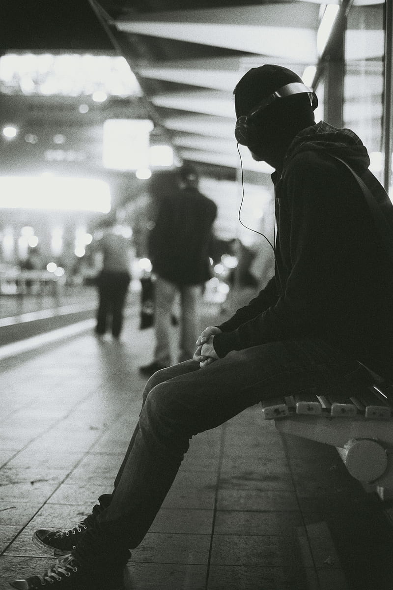 grayscale graphy of a man sitting on bench while listening music, HD phone wallpaper