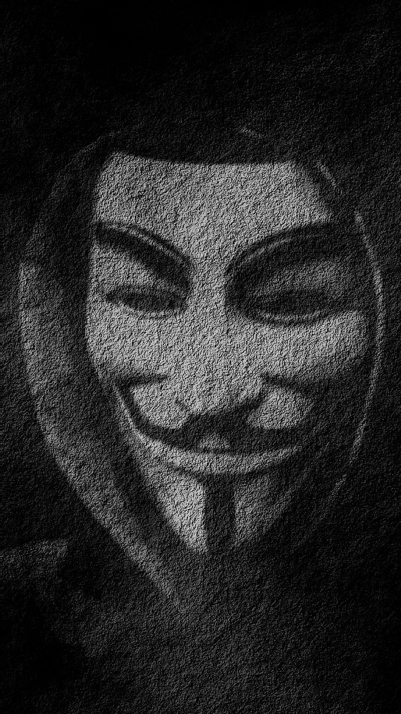 Download An Anonymous Logo Blur Wallpaper | Wallpapers.com