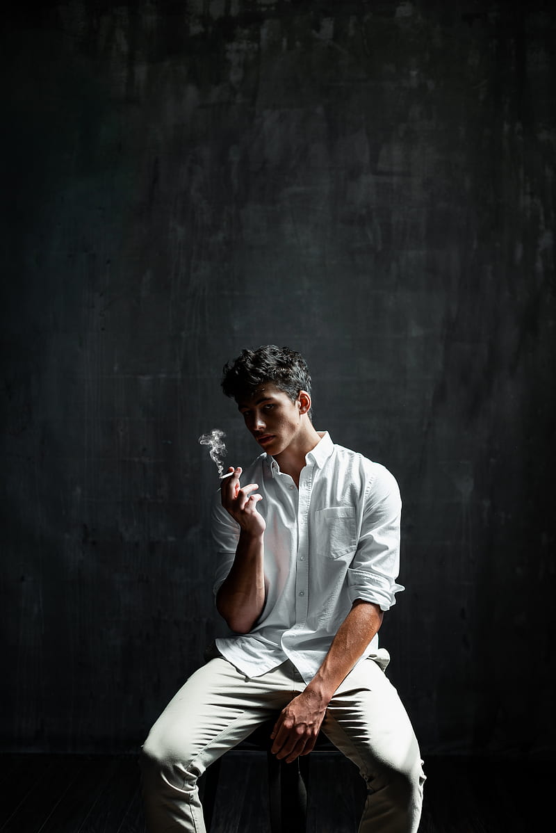 man sitting on chair smoking cigar, HD phone wallpaper