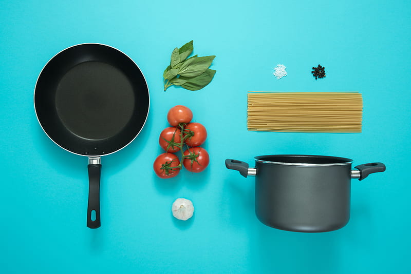 flat lay graphy of frying pan beside tomatoes on blue surface, HD wallpaper