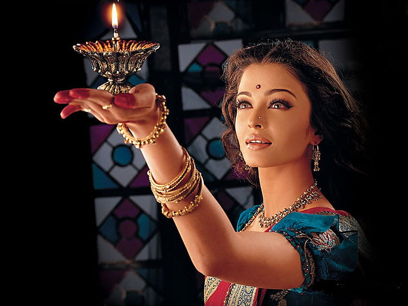 Lady with the Lamp, pretty, bracelets, yellow, women, face, skin, aishwarya rai, black, lips, jewelry, cute, fire, purple, eyes, white, red, bonito, woman, elegant, graphy, flame, actress, figure, people, girls, blue, lamp, female, exotic, indian, colors, indian actress, arm, bollywood, girl, flames, serene, oil lamp, HD wallpaper