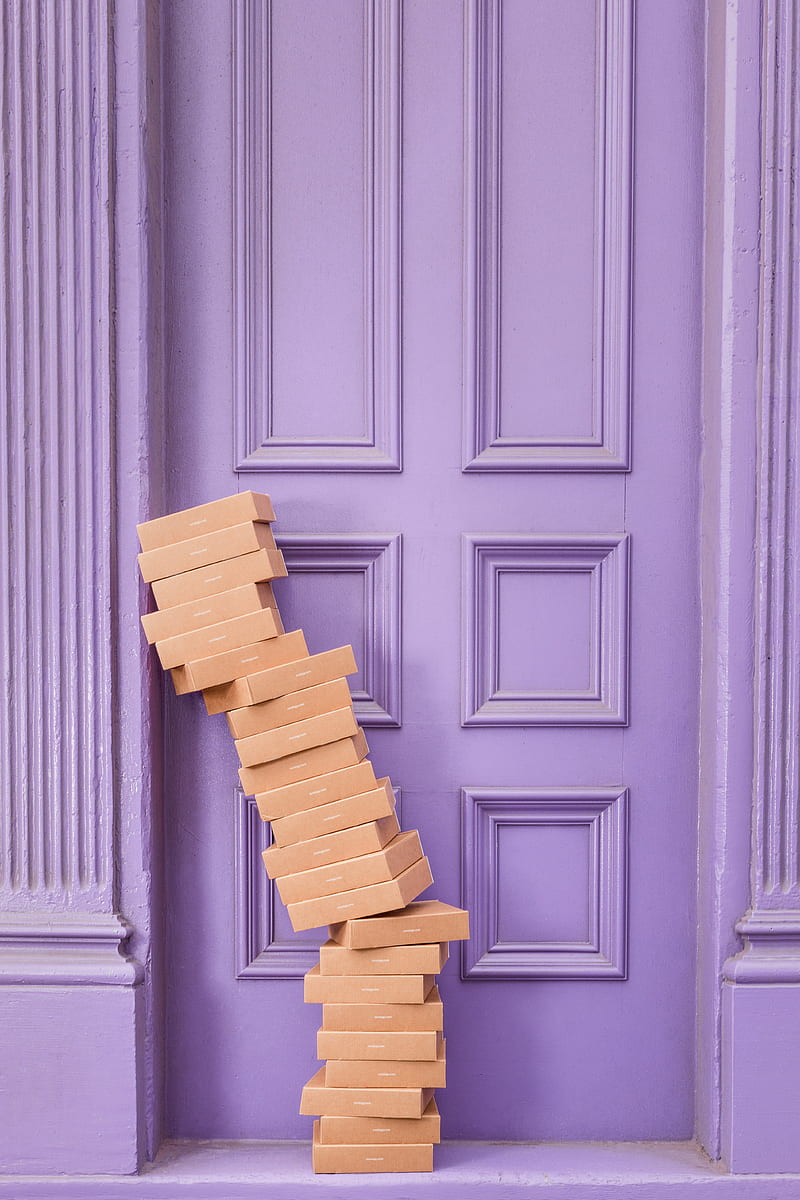 pile of brown boxes beside purple wooden wall, HD phone wallpaper