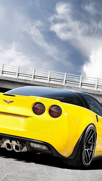 Download wallpaper 1440x2560 chevrolet corvette c5 chevrolet yellow back  view asphalt qhd samsung galaxy s6 s7 edge note lg g4 hd background