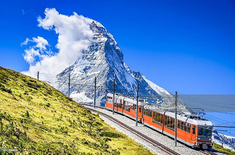 TRAIN GOING UP THE SIDE OF THE MATTERHORN, blue sky, clouds over peak, matterhorn, snow covered, green area, HD wallpaper